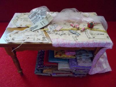 cutting table with sewing supplies